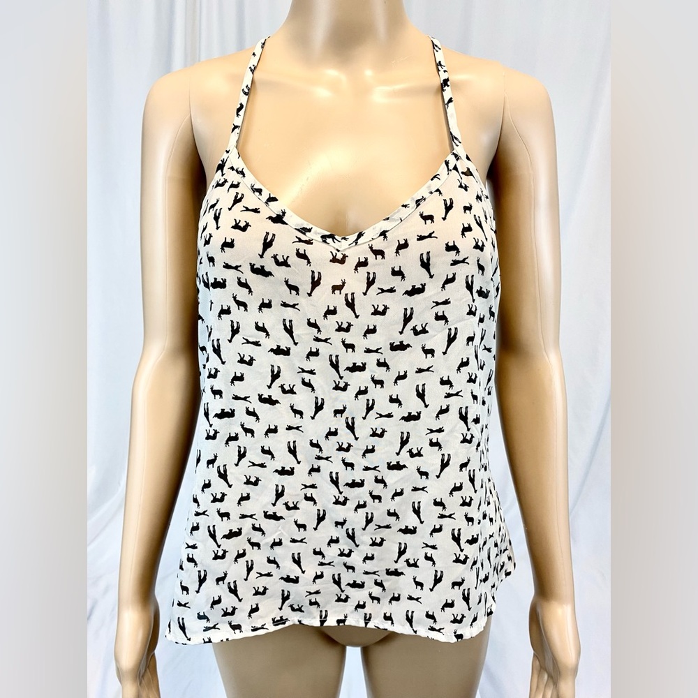 Full Tilt
Size: S
Fabric: Front 100 % Polyester, Back 50% Polyester 50% Rayon